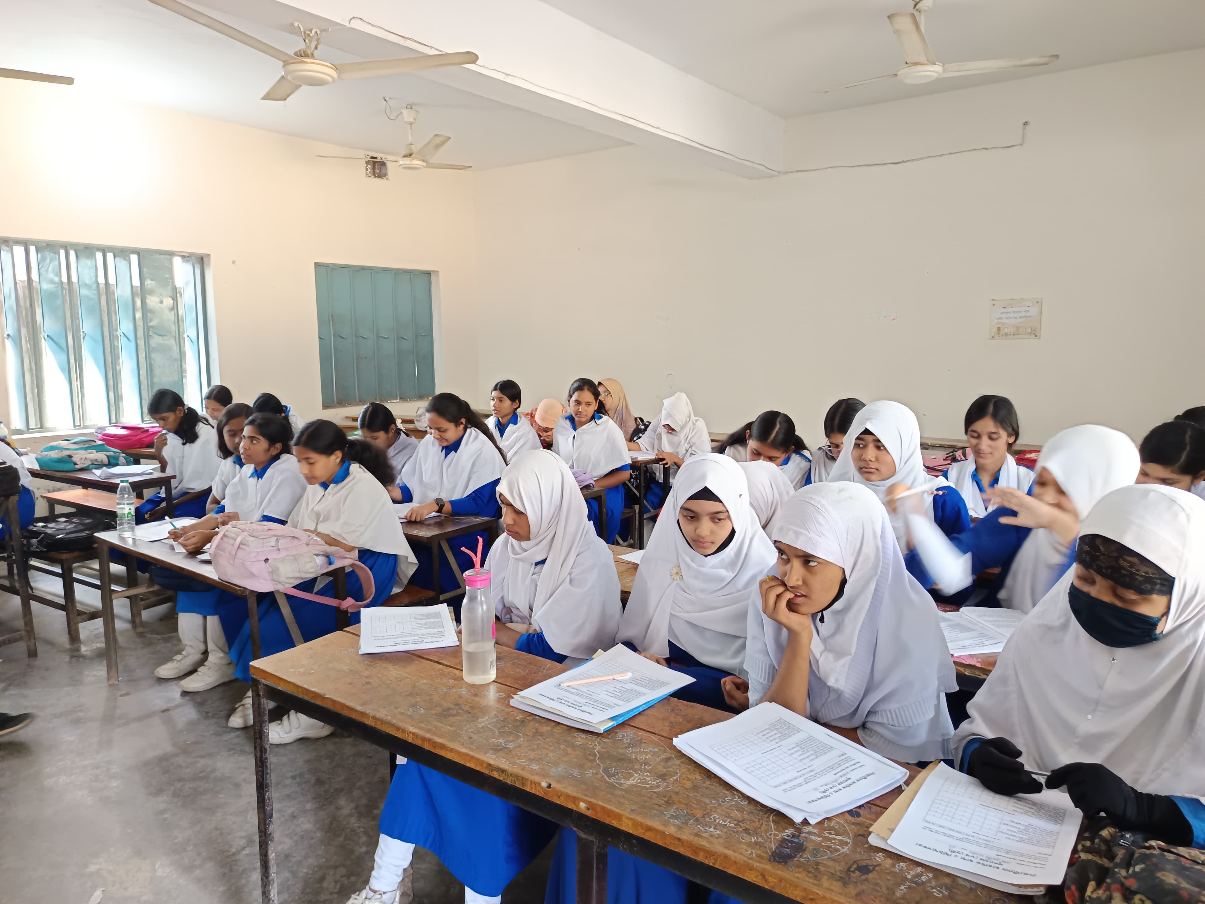 Students listening attentively during a school workshop